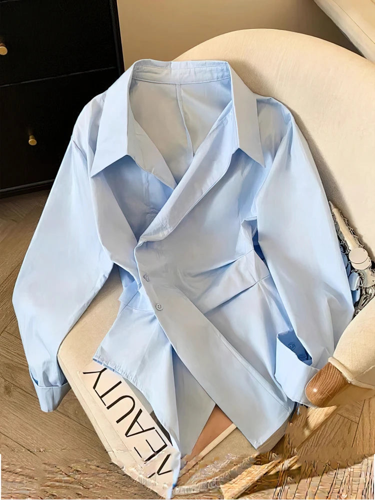 The Élisse Irregular Polo Blouse