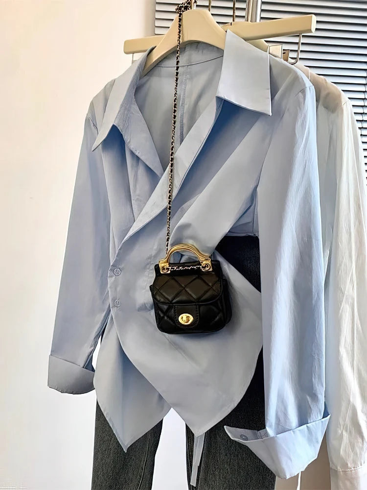 The Élisse Irregular Polo Blouse