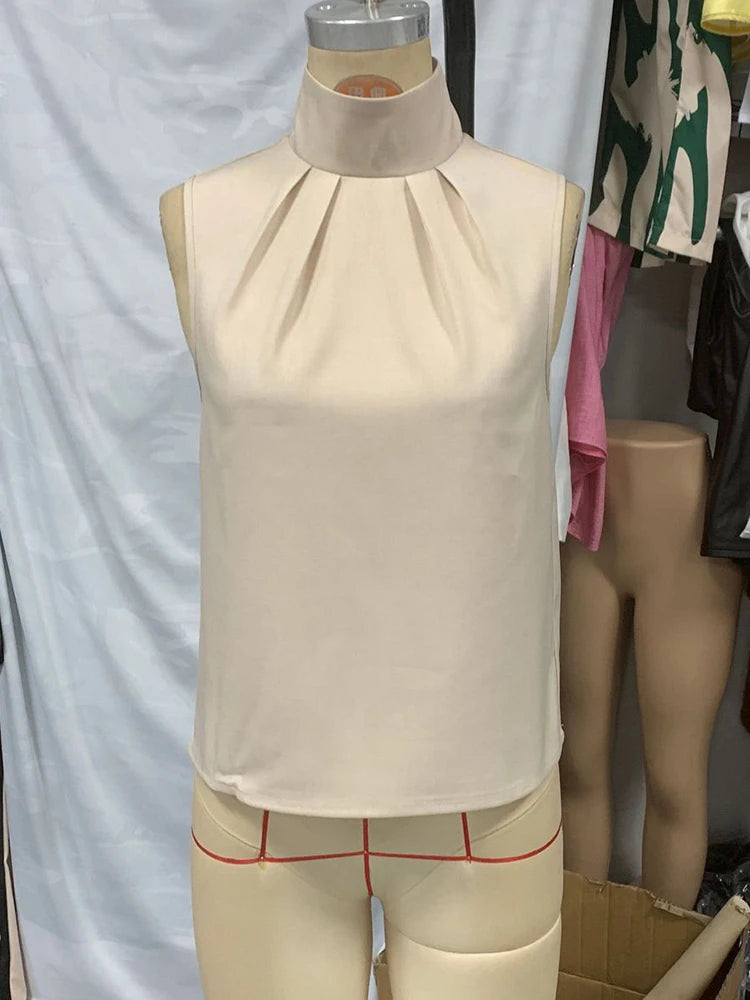 The Élyra Sleeveless Turtleneck Top